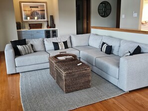 New, comfortable furniture to relax while watching TV, or the marina activity.