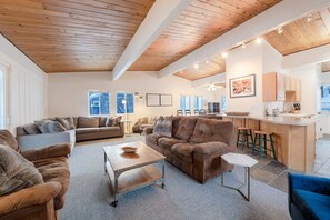 Large living room with multiple couches for group hangout/ lounge area