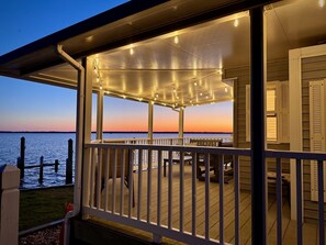 Enjoy beautiful evenings on the covered deck.