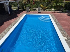 Pool - located between main house and bungalow