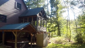 rear view- spa,  outdoor shower & screen porch