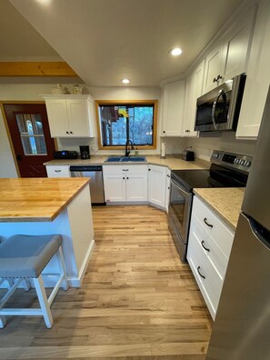 Kitchen with all new kitchen appliances 2022