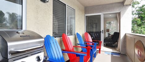 Balcony with chairs and gas bbq. STR16-0411