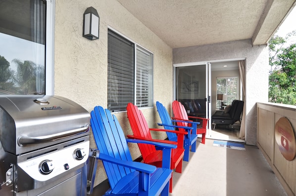 Balcony with chairs and gas bbq. STR16-0411