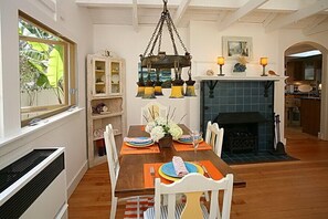 Dining Area w/vintage Roycroft 1903 hand made chandelier~ and a 1903 electric fireplace