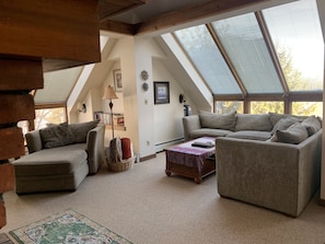 lots of room to relax in front of fireplace