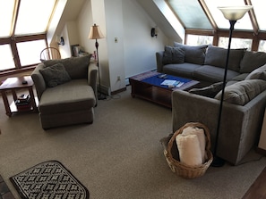 comfortable living room with large screen TV