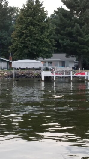 View from the lake.  Boat lift is used by owner only.  