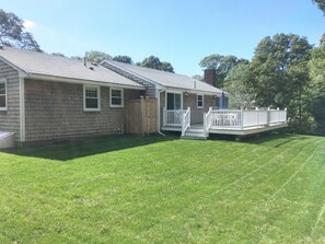 Back of Home with Deck & Outdoor Shower