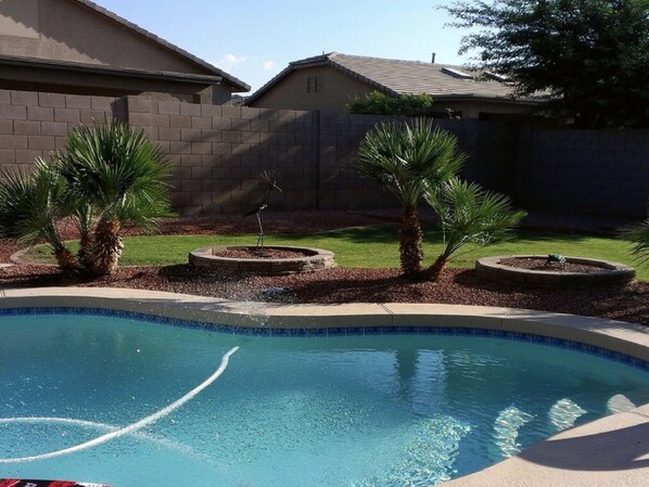 sparkling pool in the backyard.