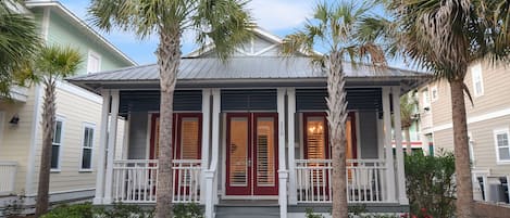 Sit and sip a glass of vino on the front porch 