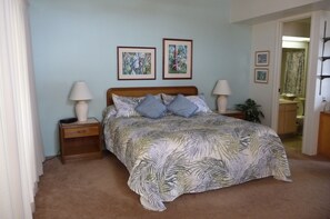 Large Master BR Suite has full bath, desk, dresser, sitting area & private lanai