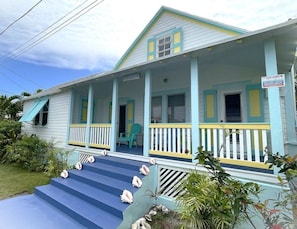 Have a memorable getaway at By the Seashore - cheery yellow and Bahama blues!