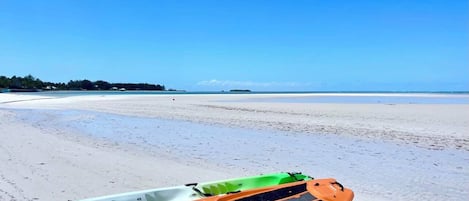 Kayak & Paddleboard provided at By the Seashore- just steps away to the beach!