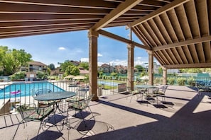 Sports Village's two pools, two hot tubs, a kiddie pool, courts, & a game room
