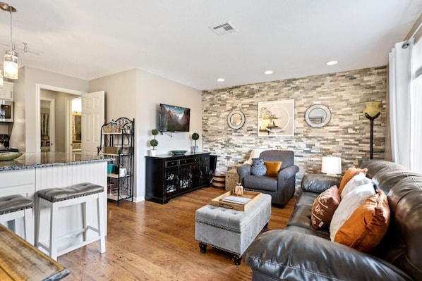 Open floor plan with an enormous bedroom and semi-private balcony.