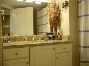 guest bathroom w/ bath & shower