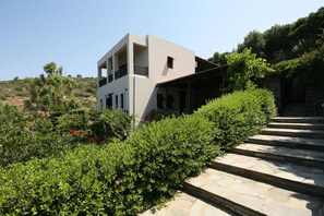 south view of the house and stairs to go to the entrance veranda  