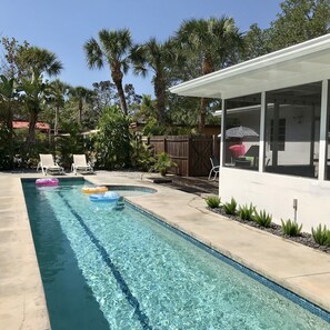 Sparkling blue heated 50 ft lap pool.