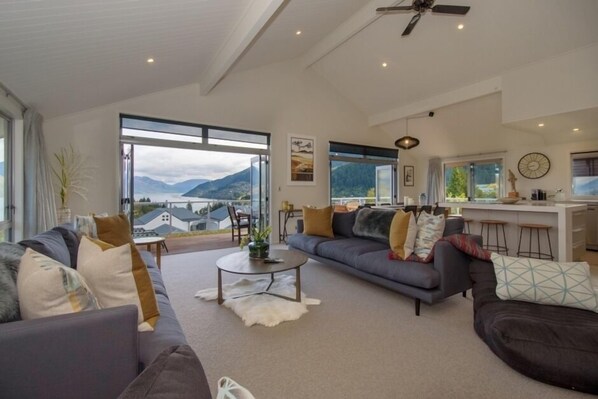 Living room with wrap around deck 270 deg views of Lake, Remarks, Town & Gondola