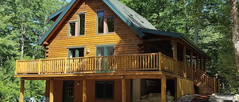 Side view of cabin and wrap-around porch