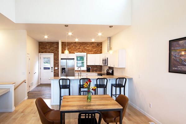 Kitchen, bar and dining