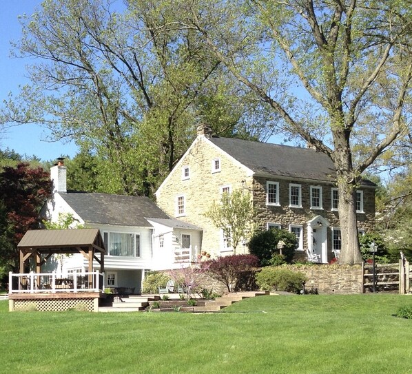 Stunning 3500 sq. ft. stone home with POOL on immaculate 50 acre horse farm