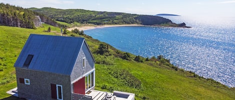 summer sun on the while overlooking the ocean and island