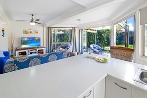 Front kitchen to lounge and backyard open concept floor plan