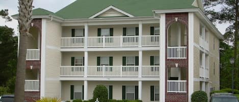 Front View of Condo and Parking Area