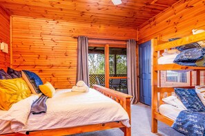 Bedroom 2 - Queen bed and also a set of single bunk beds