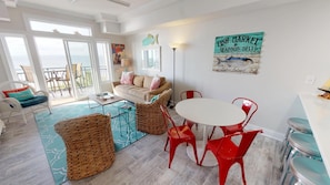 Informal dining area with additional seating at the kitchen counter/breakfast bar