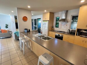 OPEN PLAN KITCHEN LIVING DINING.