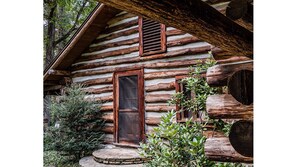 What was once the original front door, now leads to the back fire pit 