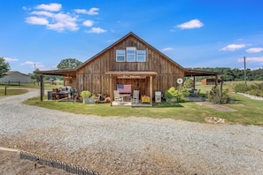 The front of the Rustic Retreat has ample space for parking.