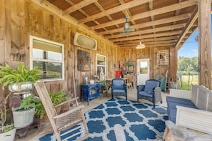 Gather on the side porch while you enjoy the peaceful sounds of the farm.