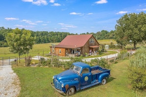 Our iconic blue truck overlooking the Rustic Retreat.