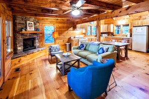 1st floor living room and kitchen with gas fireplace
