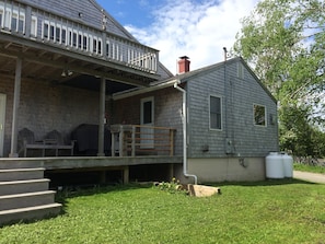 Private lower patio with BBQ.  Cedar chairs, back yard use.