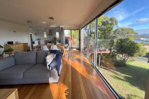 Expansive glass windows in the living dining area.