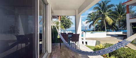 Our 1st floor patio overlooking pool and beach!