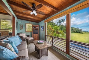 Hanalei HMBC oceanfront living room view left - Enjoy the beach view from the couch, or just walk across the lawn to put your feet in the sand.