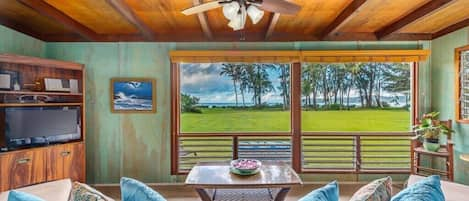 HMBC Living Room Ocean Front View - Hanalei Moon has you enjoying Hanalei Bay from your cozy ocean front living room.