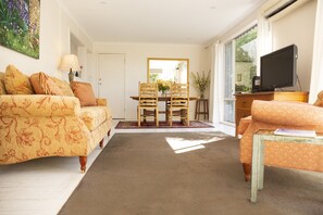 Open plan living and dining room at Dairy House.