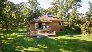 Aerial view of the house from the lakeshore.