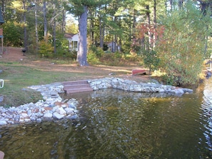 view of steps and water (high water pre-summer season)
