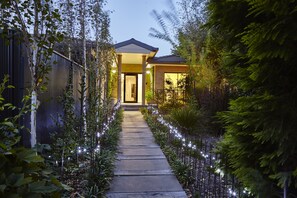 Landscaped garden pathway to your own private oasis