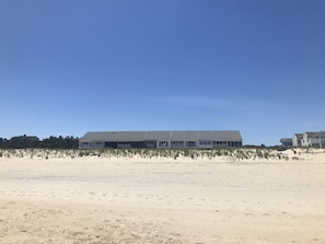 View of the beach house from beach chair