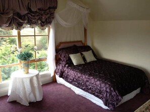Double master bedroom includes two double beds.