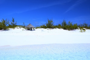 Boathouse beach and tiki hut on private 235' of white sand beach